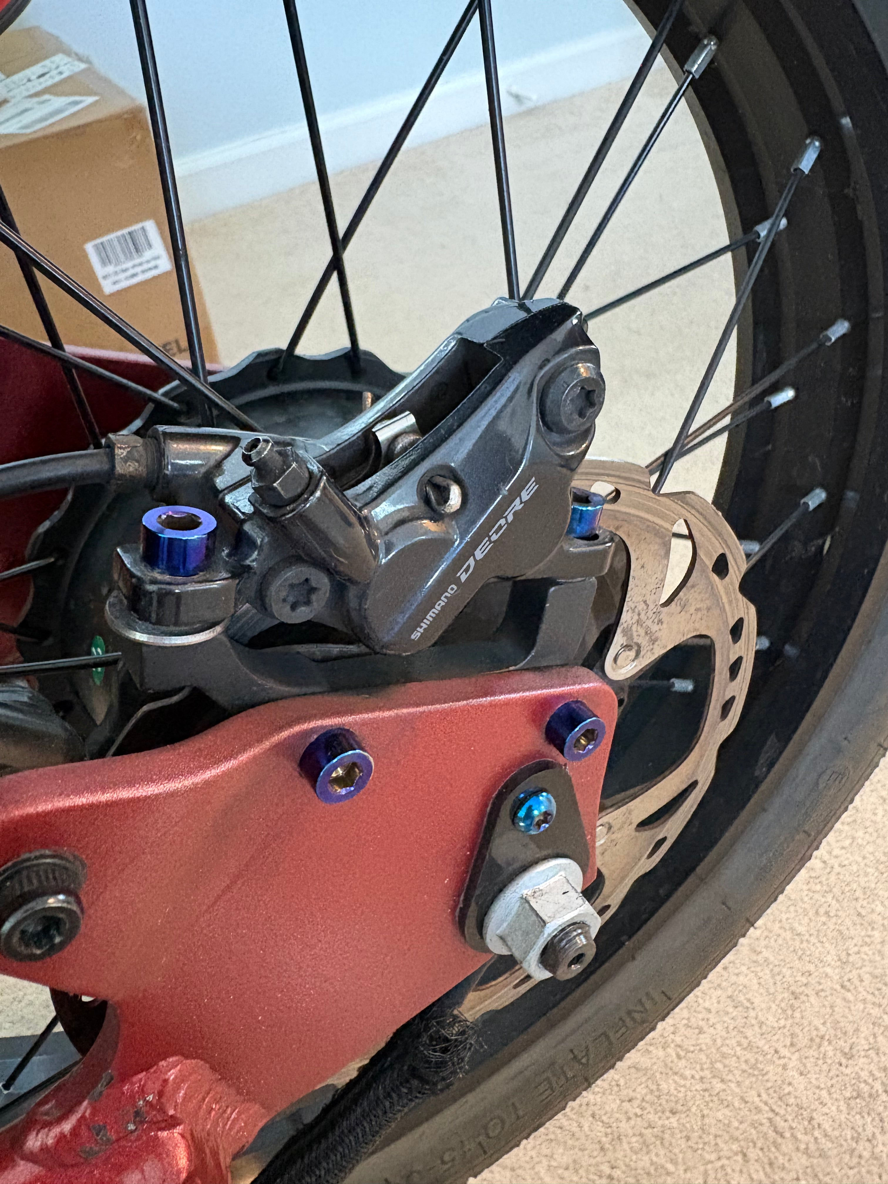 Titanium brake caliper bolts